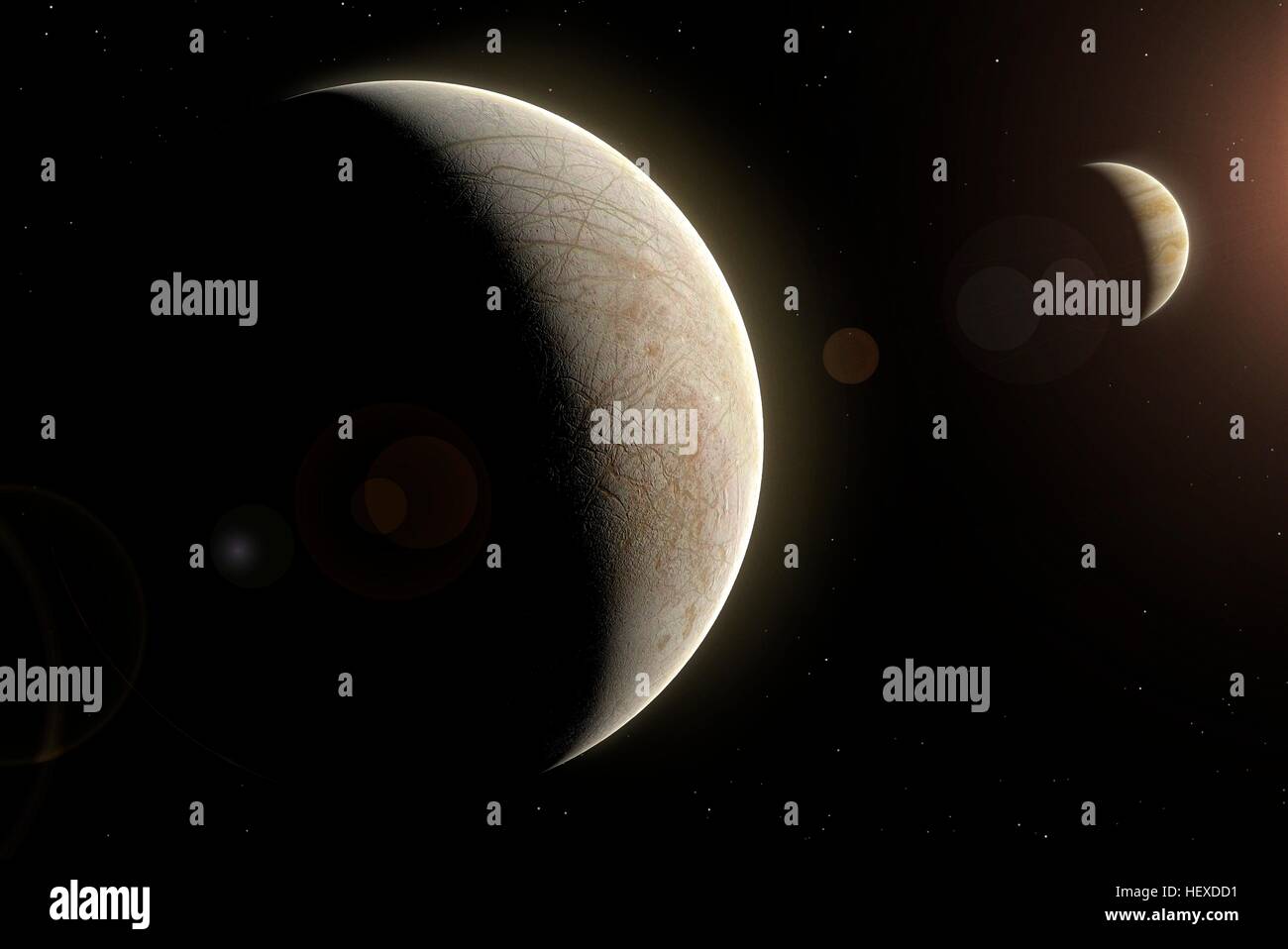 Europa is one of the four Galilean moons of Jupiter, the second farthest one from the planet. Its surface is a cracked shell of water ice with very few impact craters. Mostly likely there is liquid water beneath it. Jupiter is also shown in the background in this scene. Stock Photo