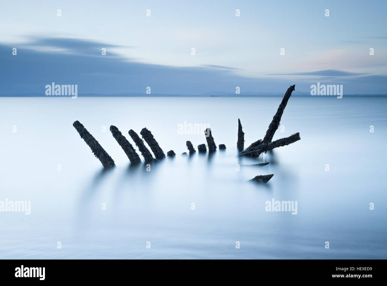 Longniddry ship wreck, the remains of an old ship wreck on the shore of the Firth of Forth estuary near Edinburgh, Scotland Stock Photo