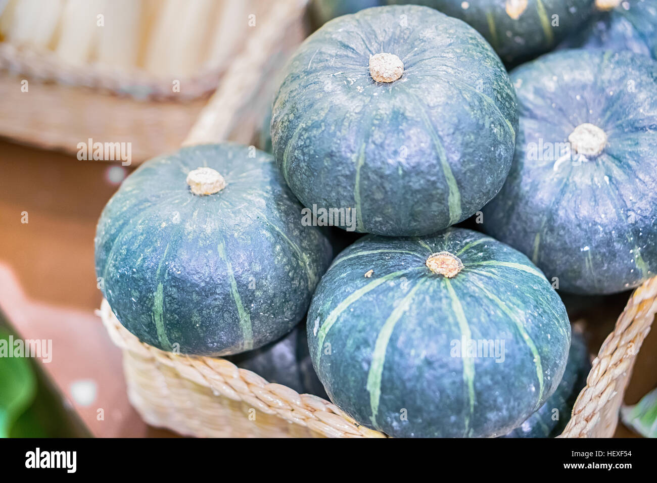 piles of green pumpkin in farm during harvest season Stock Photo - Alamy