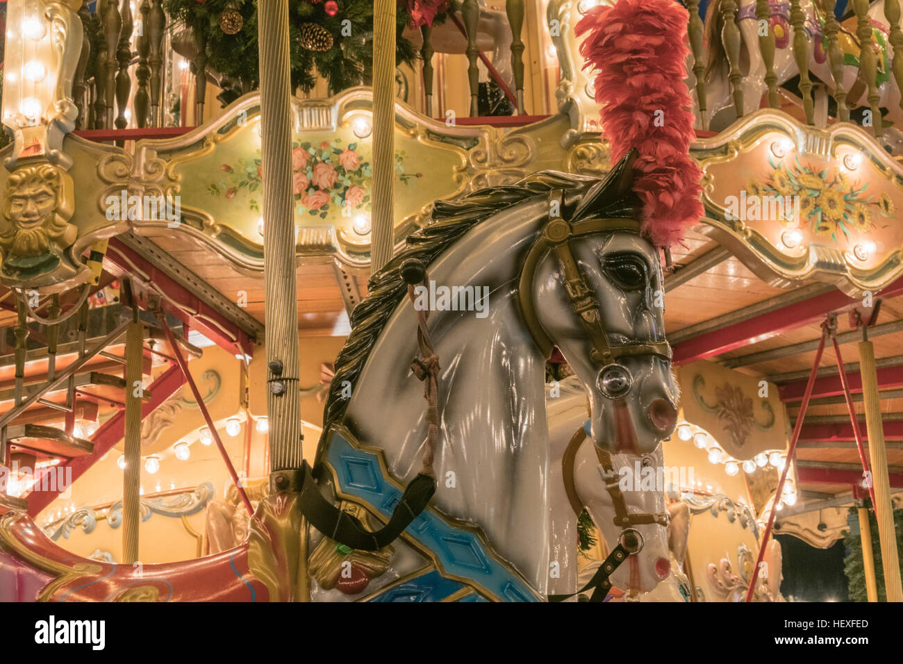 Detail of horse's carousel fun fair ride in Christmas fun