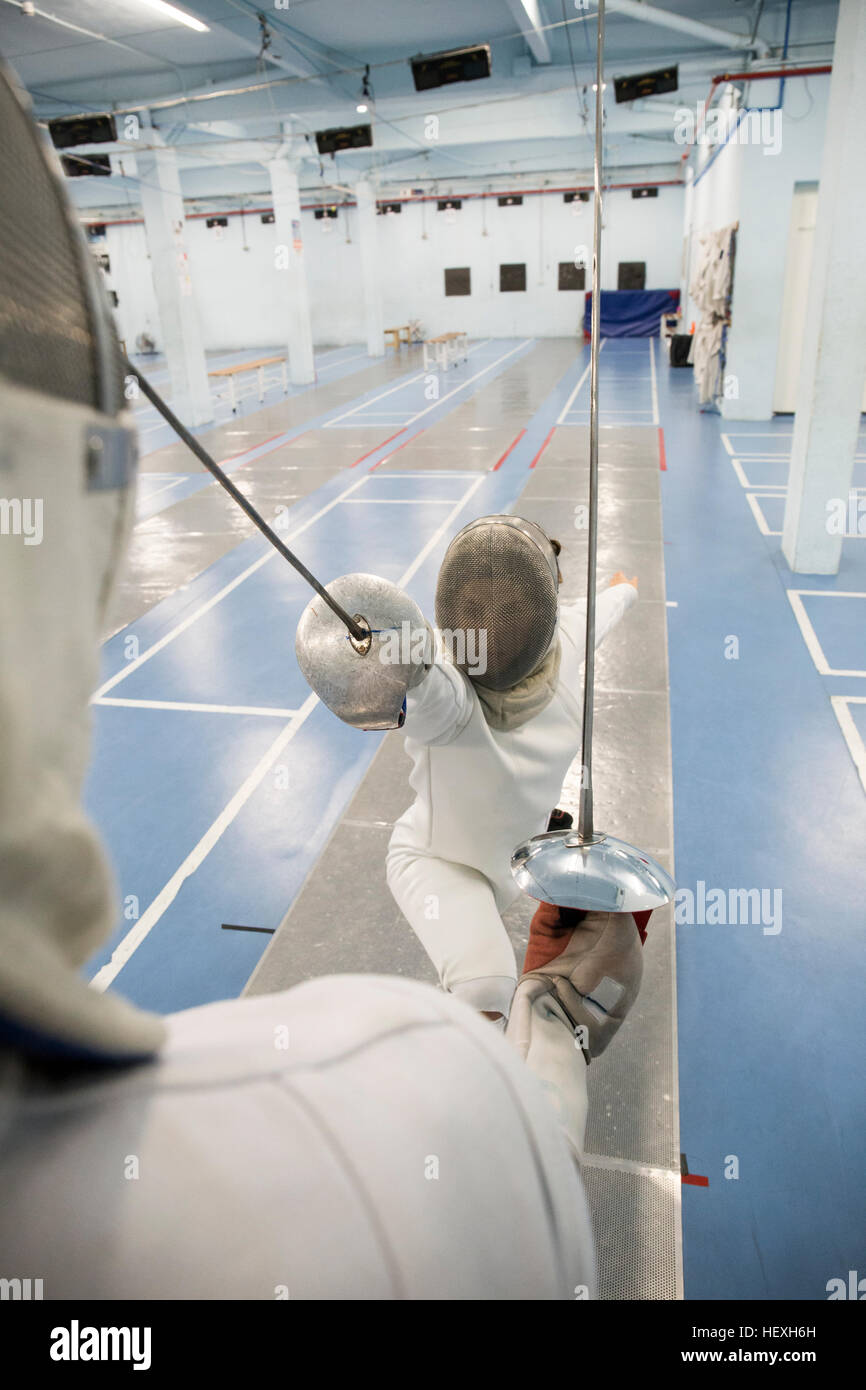 Female fencer during a fencing match Stock Photo Alamy