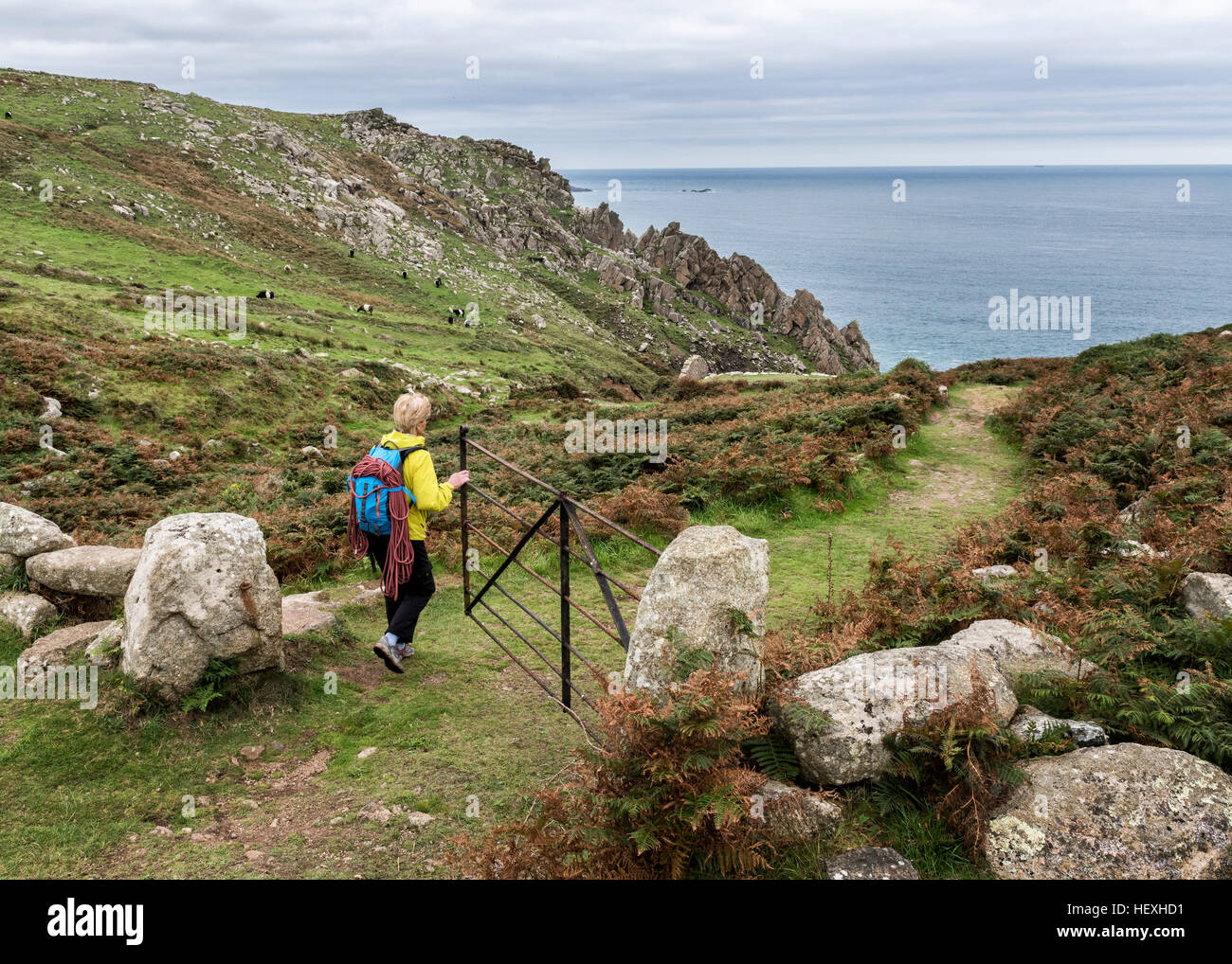 UK, Cornwall, woman at Commando Ridge climbing route Stock Photo