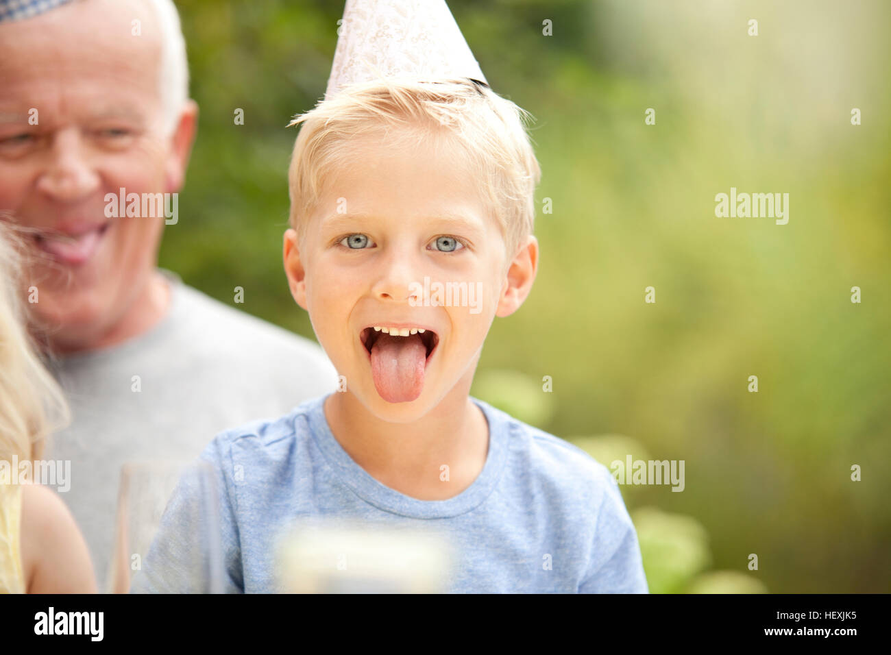Boy wearing birthday party hat hi-res stock photography and images - Alamy