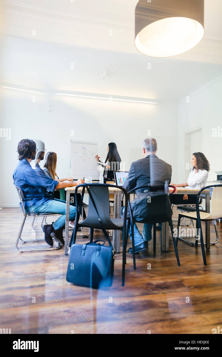 Business people having a team meeting in office Stock Photo - Alamy