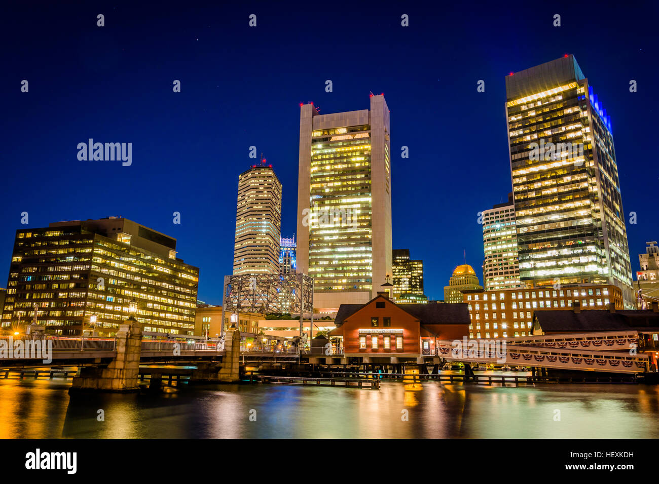 The Boston skyline and Fort Point Channel at night, in Boston