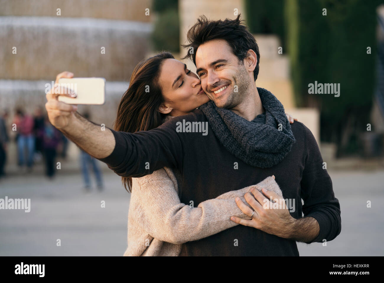 Couple in love taking selfie with cell phone Stock Photo - Alamy