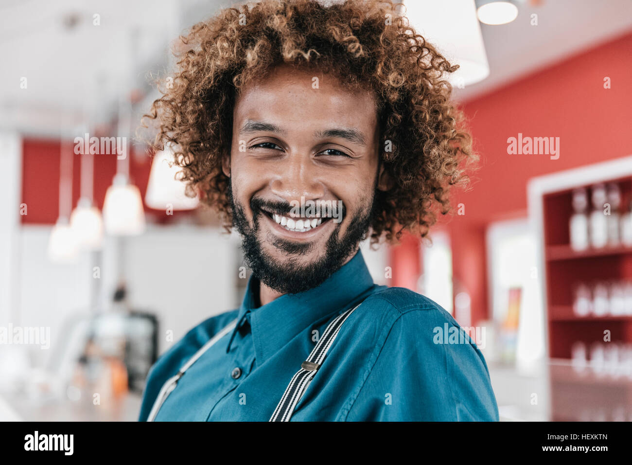 Cheerful man curly hair hi-res stock photography and images - Alamy