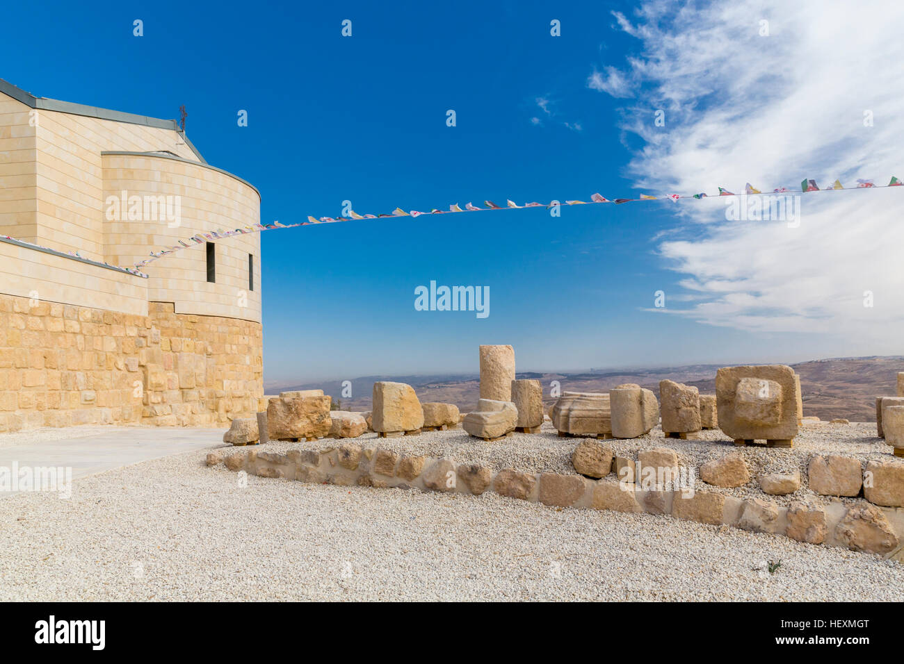 Jordan, Madaba, Province, view to New Church and stones of the old Memorial Church Stock Photo