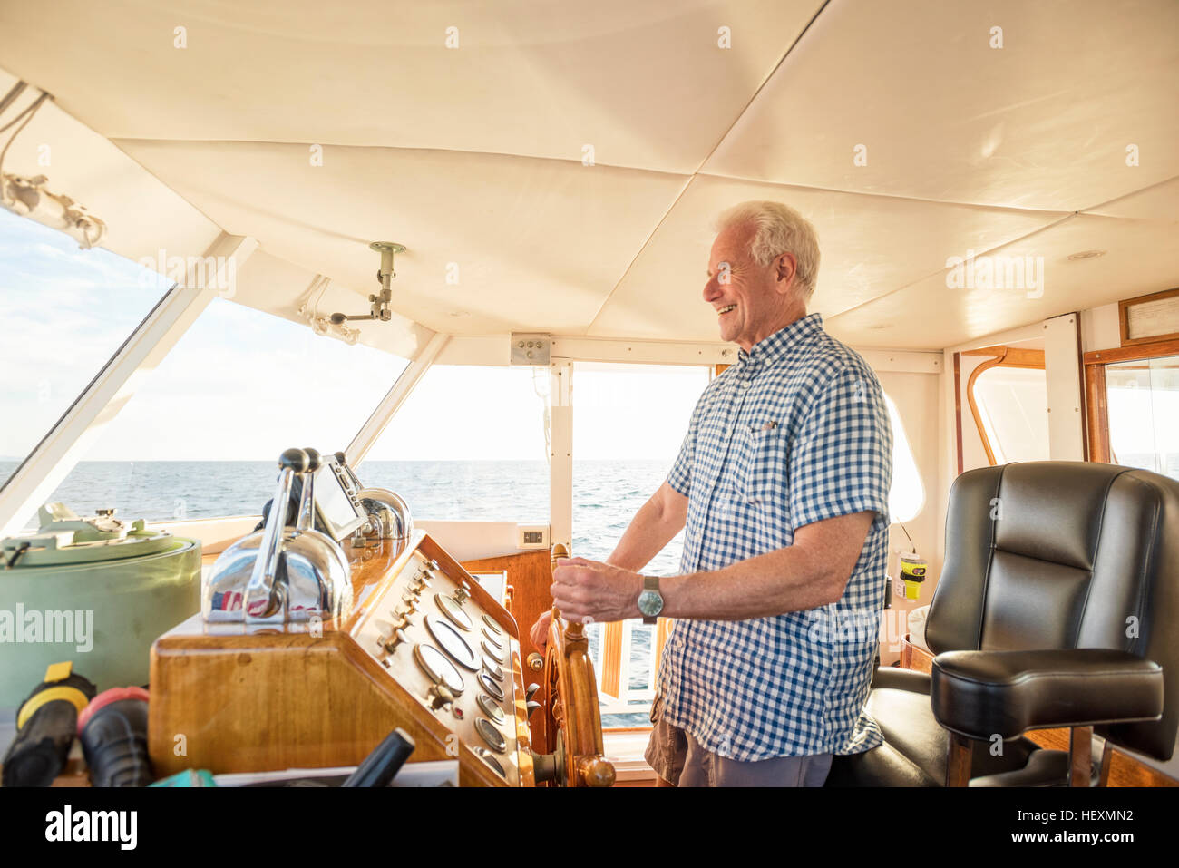 Steering the boat hi-res stock photography and images - Alamy