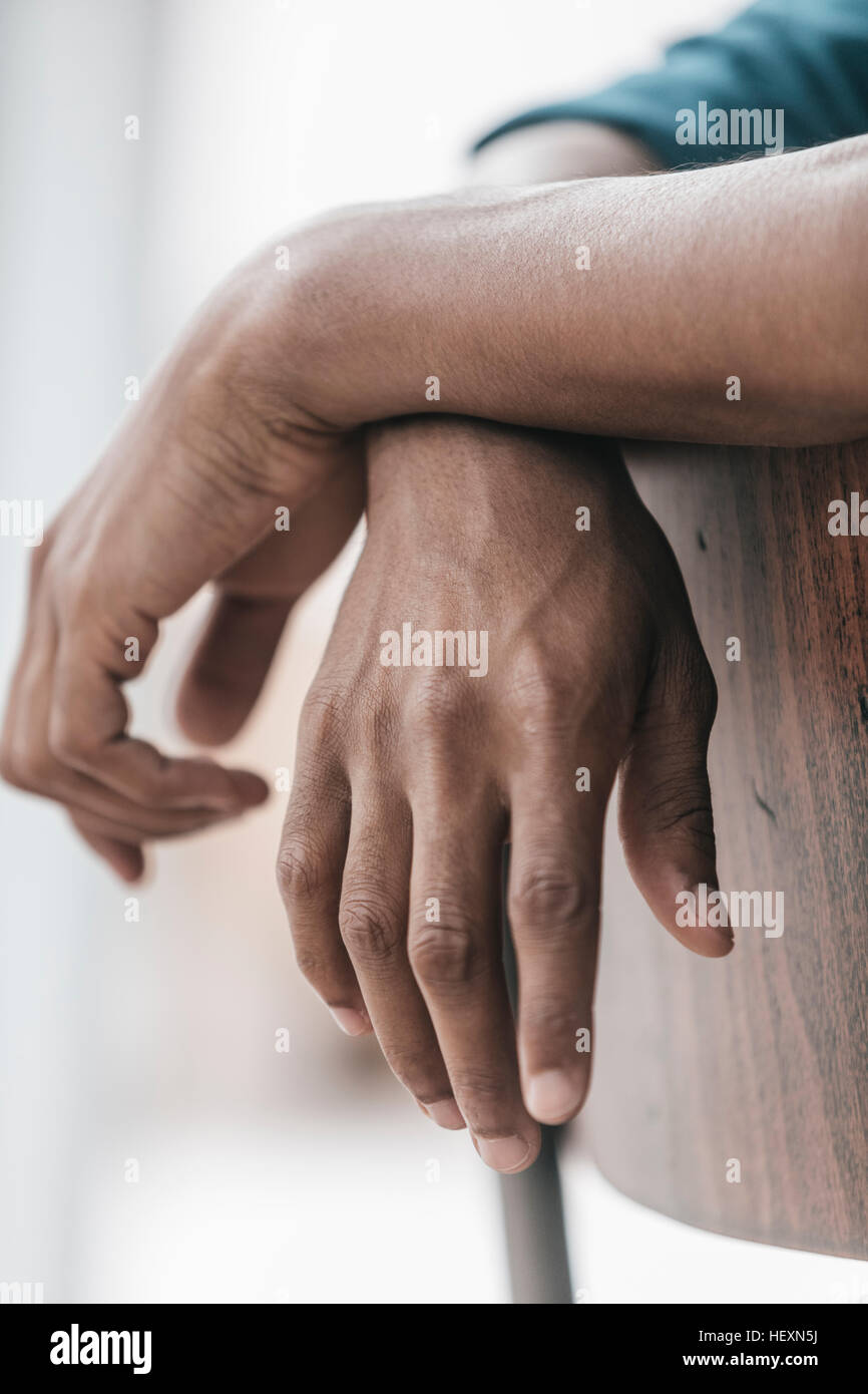 Hands of a young man, close up Stock Photo