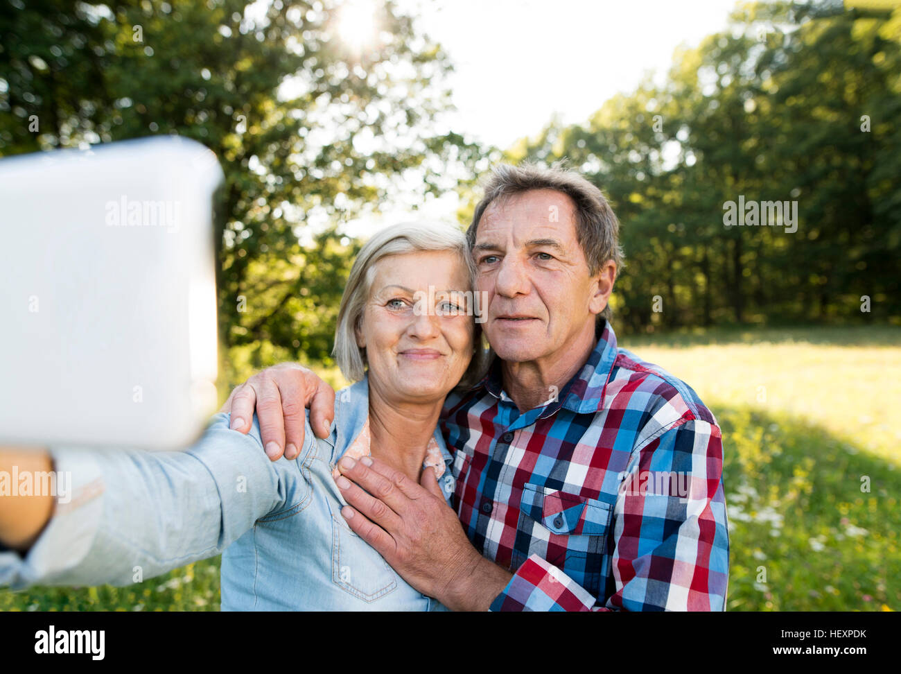 Couple taking selfie in nature hi-res stock photography and images - Alamy