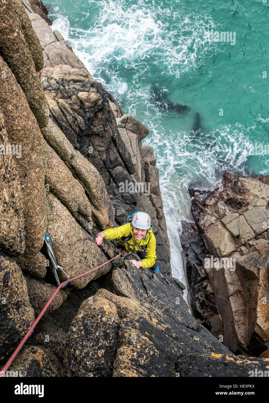 UK, Cornwall, woman climbing on Commando Ridge Stock Photo Alamy