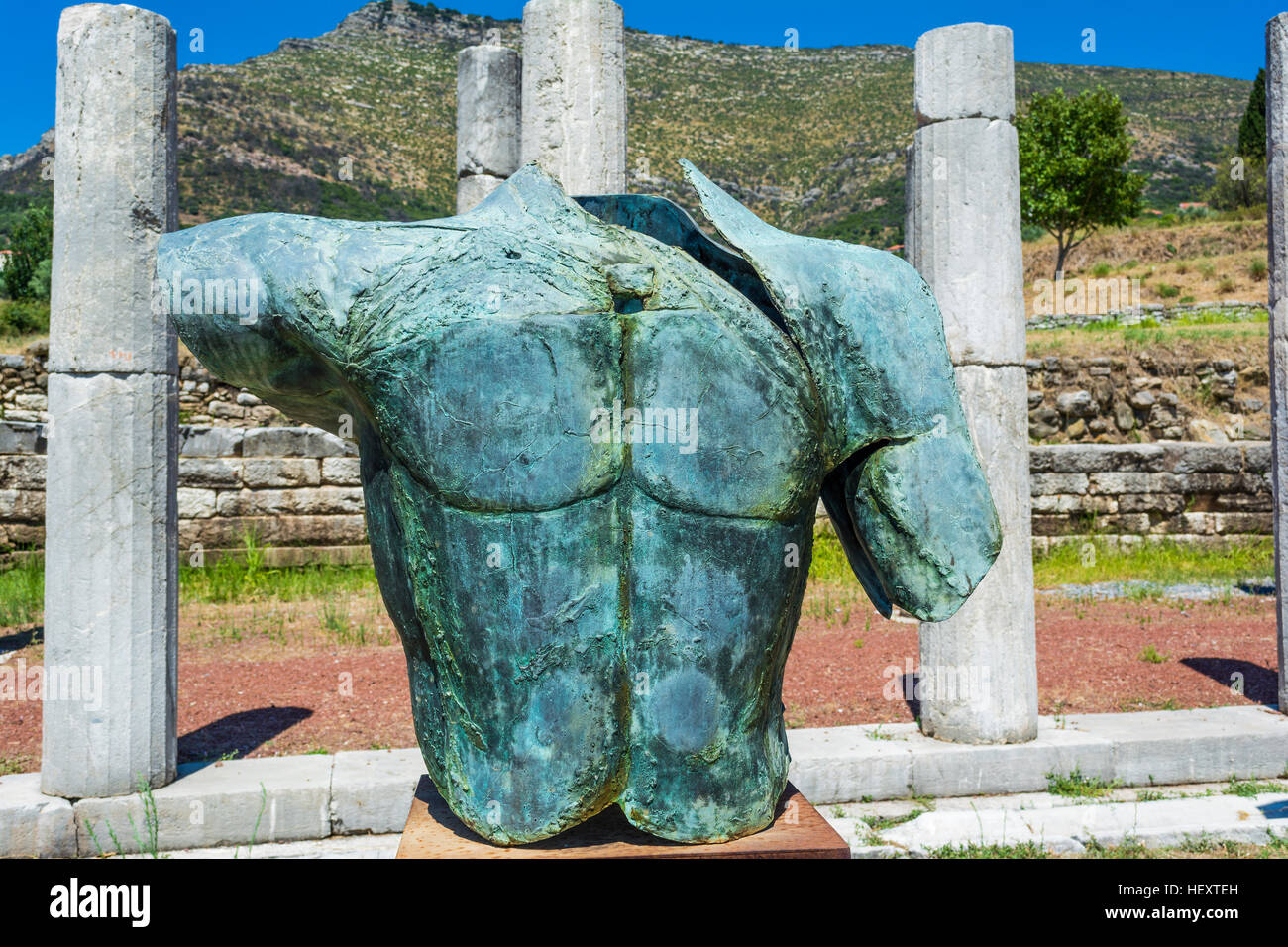 Metallic headless statue in the ancient Greek city of Messinia at