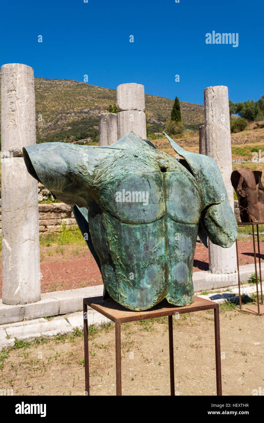 Metallic headless statue in the ancient Greek city of Messinia at