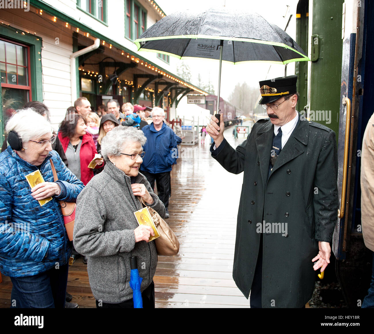 Polar Express Christmas train ride conductor Rob Payette at the West Coast Railway Park.  Squamish BC, Canada Stock Photo