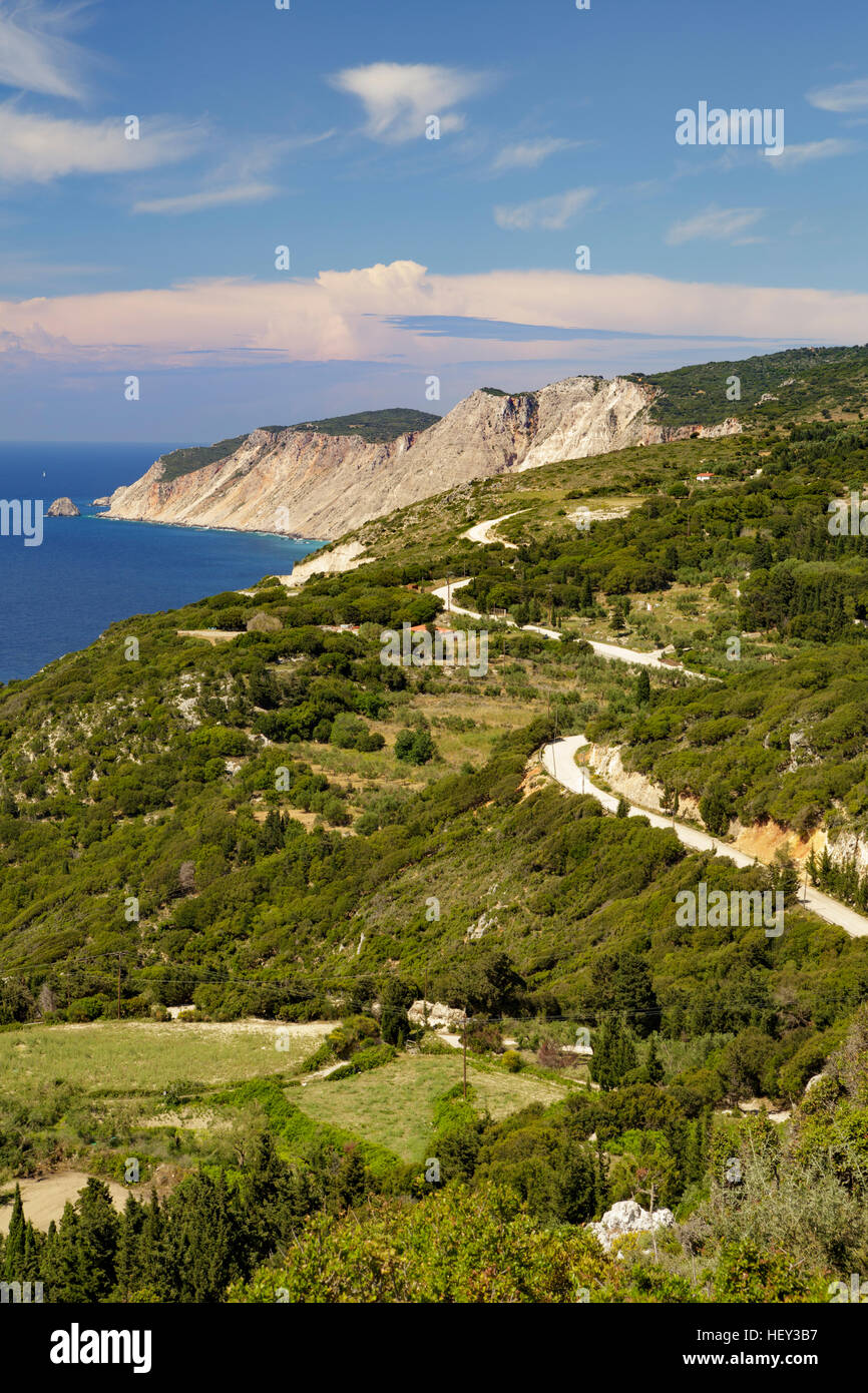 The coast road winds along the West coast of Kefalonia, Greece Stock Photo
