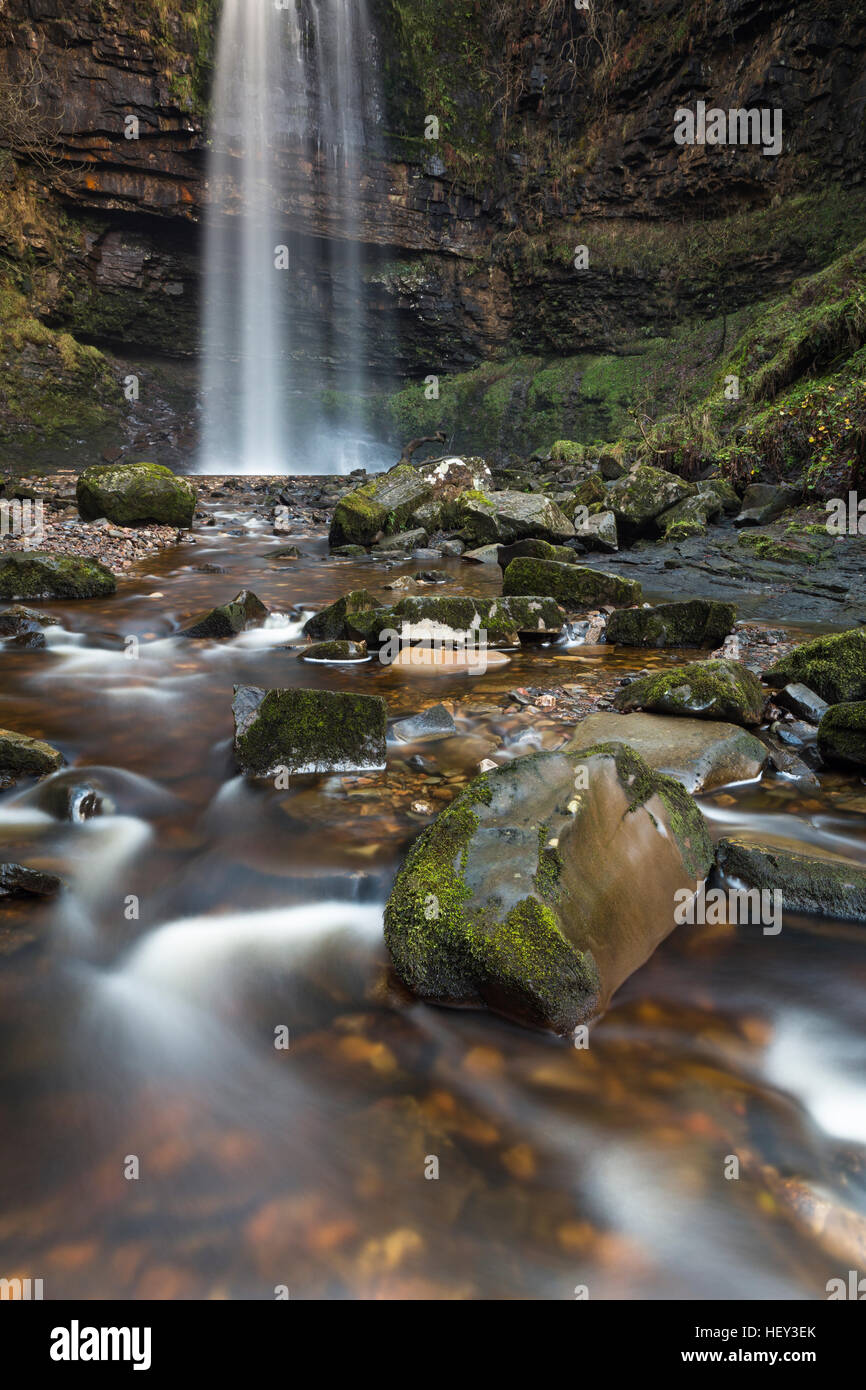 Henrhyd Falls, Sgwd Henrhyd, is the highest waterfall in South Wales. The Nant Llech drops over the hard sandstone known as Farewell Rock. Stock Photo