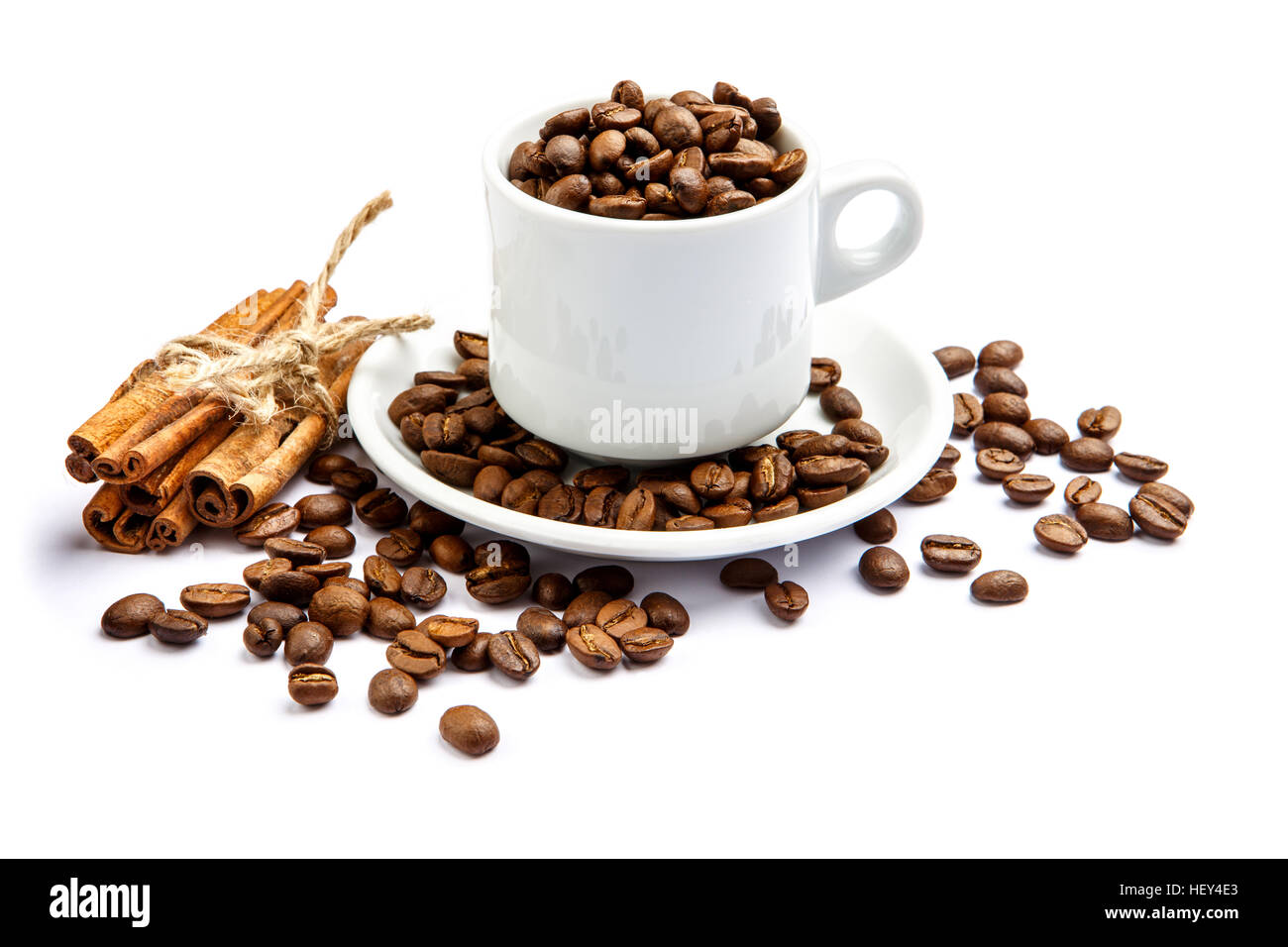 cup of coffee beans on white background Stock Photo - Alamy