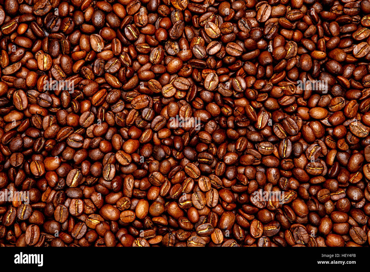 roasted coffee beans background Stock Photo - Alamy