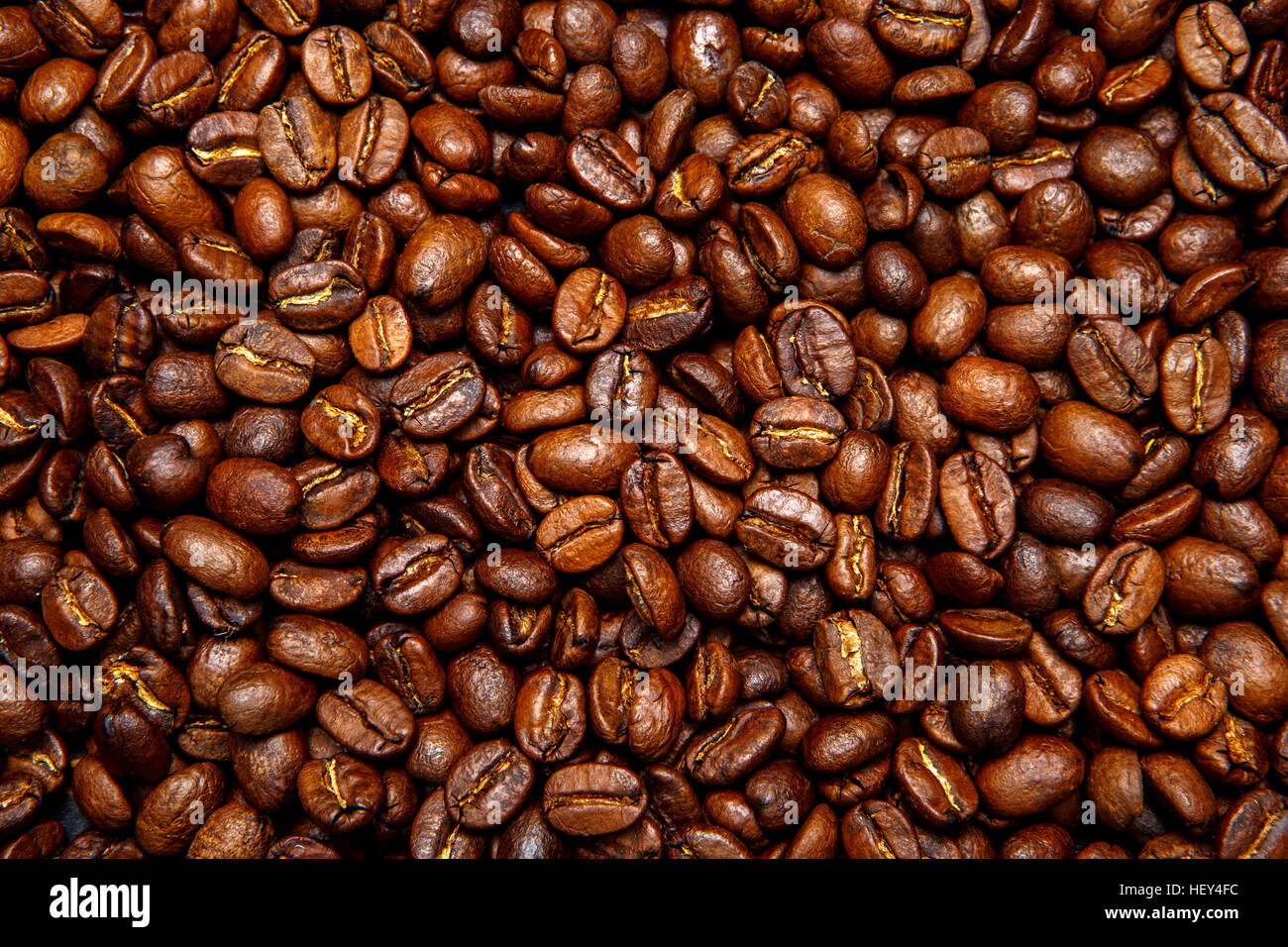 roasted coffee beans background Stock Photo - Alamy