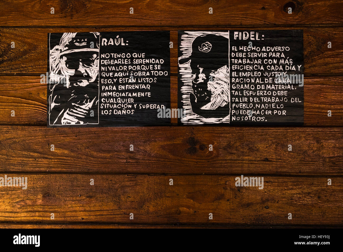 Propaganda posters with Raul and Fidel Castro on a wall in Yomuri, Baracoa, Cuba Stock Photo