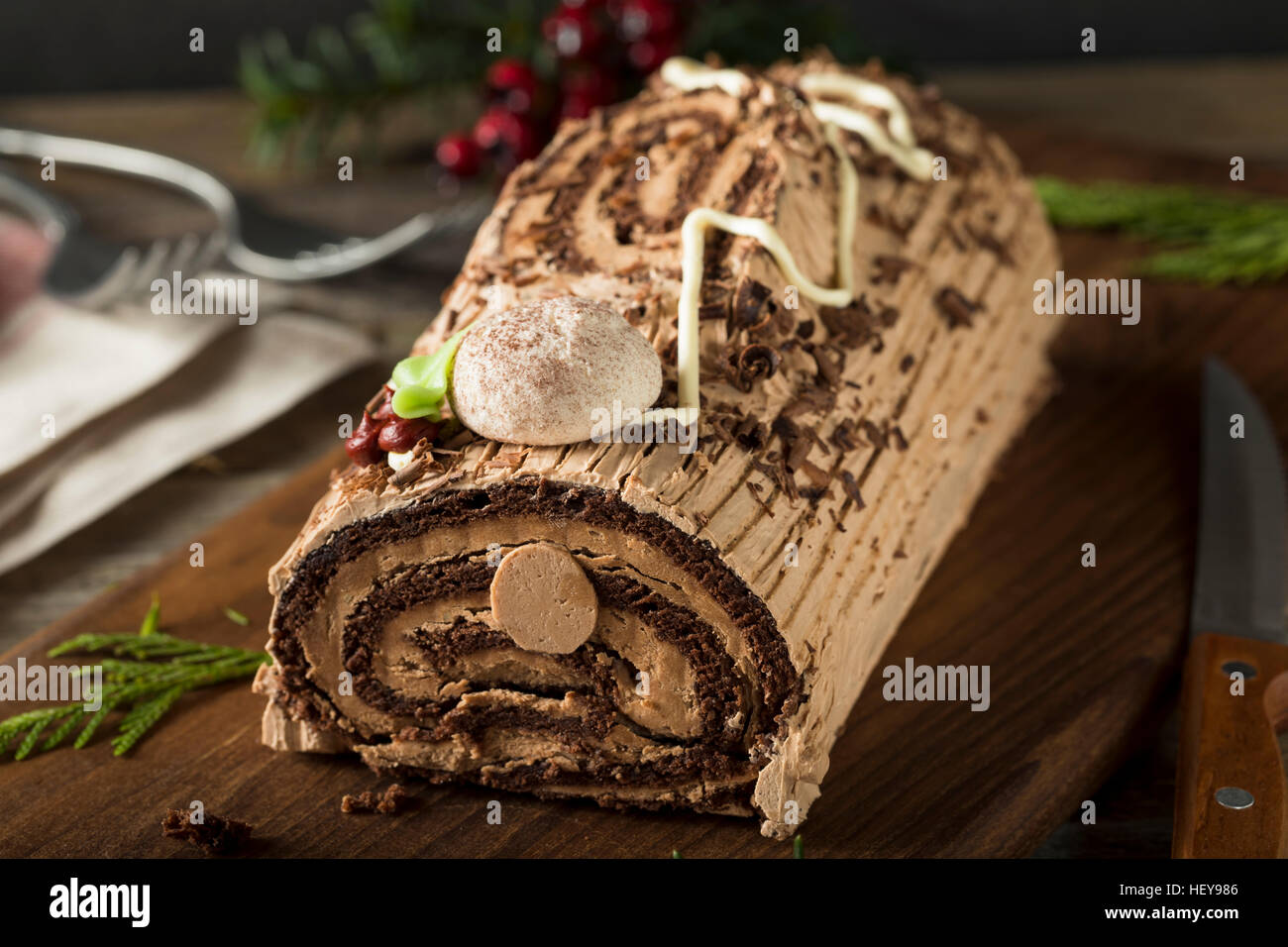 Homemade Chocolate Christmas Yule Log with Mousse and Frosting Stock Photo