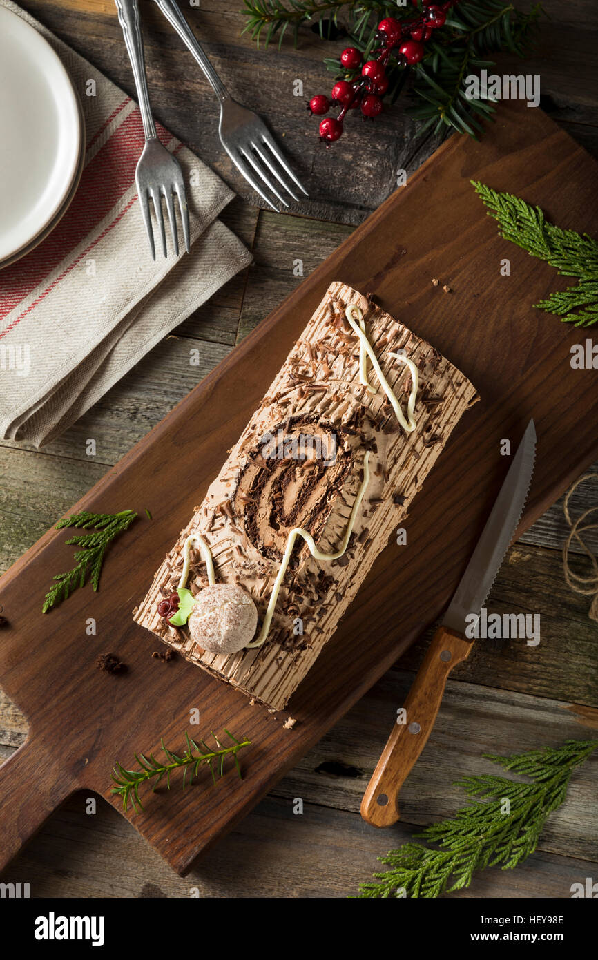 Homemade Chocolate Christmas Yule Log with Mousse and Frosting Stock Photo