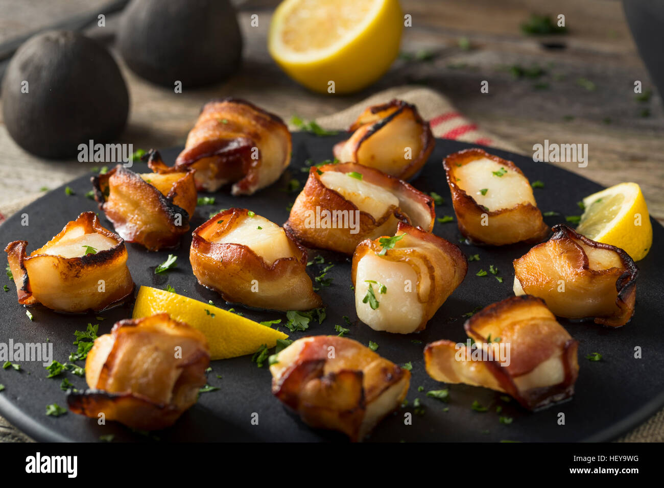 Homemade Bacon Wrapped Scallops with Salt and Pepper Stock Photo Alamy