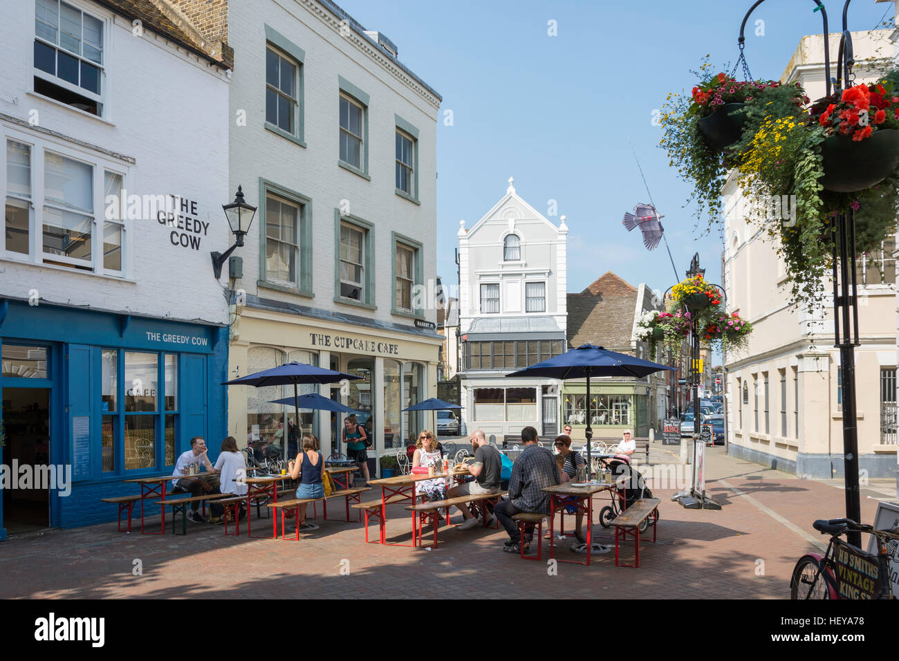Outdoor seating at The Cupcake and Greedy Cow cafes, Market Place, Old Town, Margate, Kent, England, United Kingdom Stock Photo