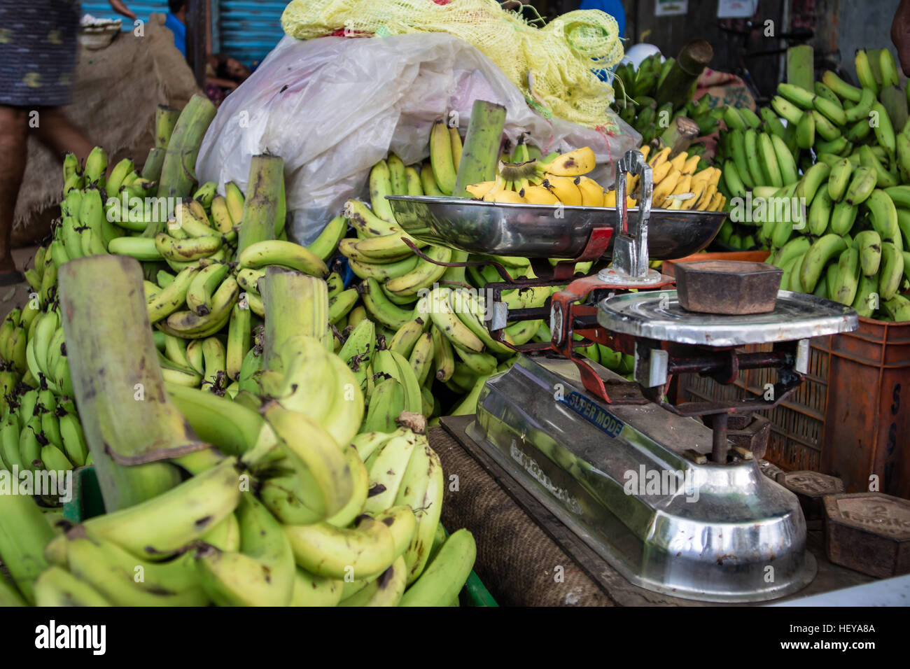 Wholesale bananas market and weighing, Kerala, India Stock Photo