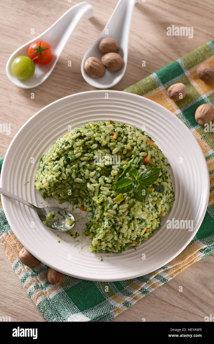 baked rice with spinach Vegetarian Italian Recipe Stock Photo Alamy