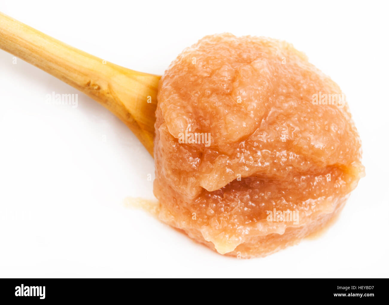 salty caviar of alaska pollock in wooden spoon on white plate 