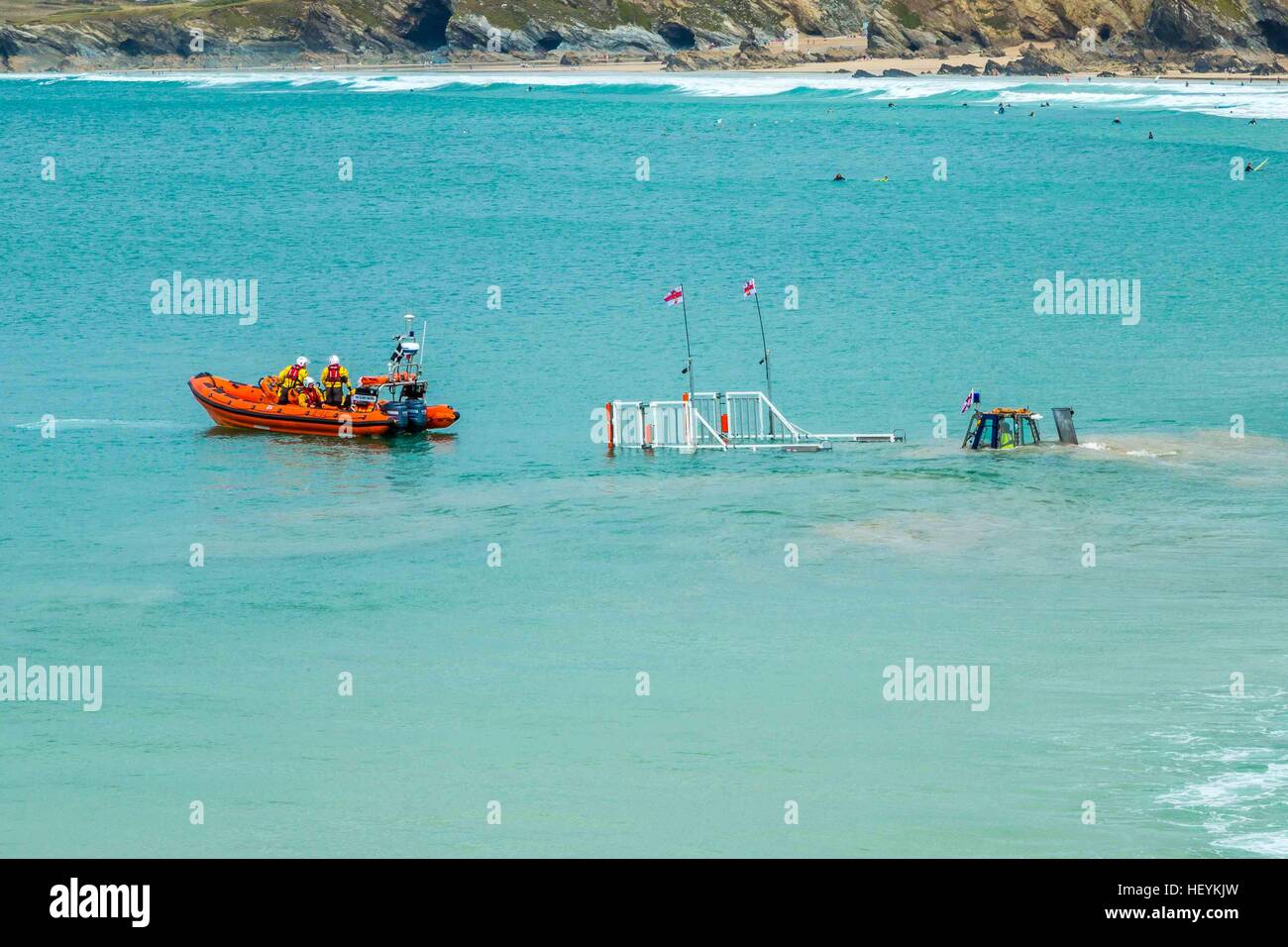 The Newquay RNLI life boat returning to the harbour in Cornwall on it;'s cradle Stock Photo