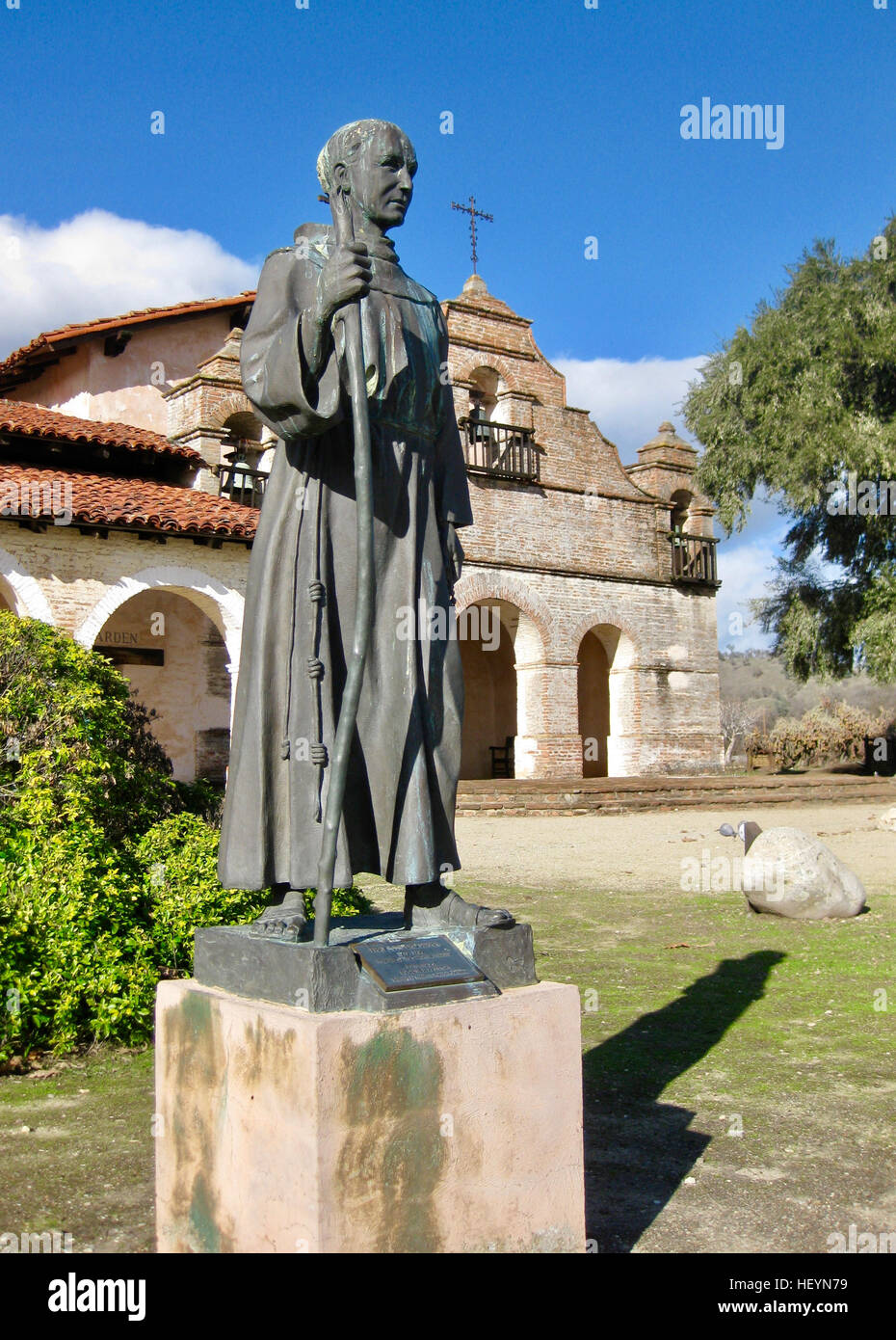 Father Junipero Serra statue in front of Mission San Antonio Stock Photo