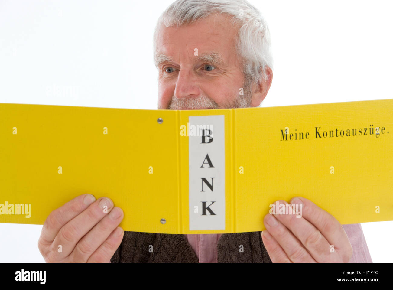 Retiree, senior looking through his account transactions, bank statement Stock Photo