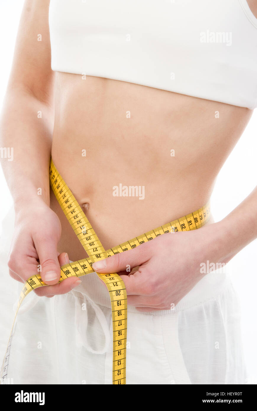 Slim woman measuring her thin waist Stock Photo by ©stockasso 80139016