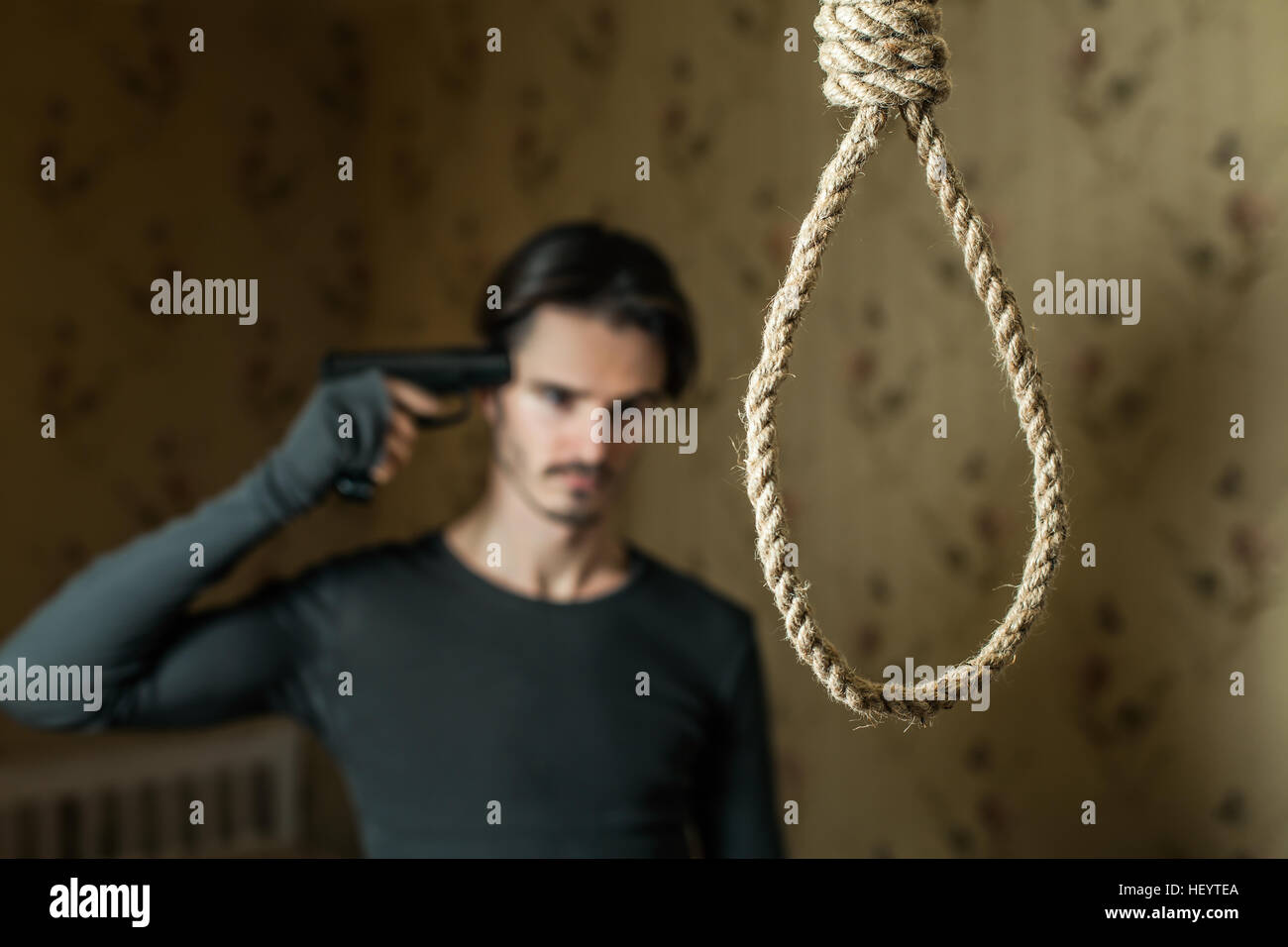 Man commit suicide with a shot in the head. Stock Photo