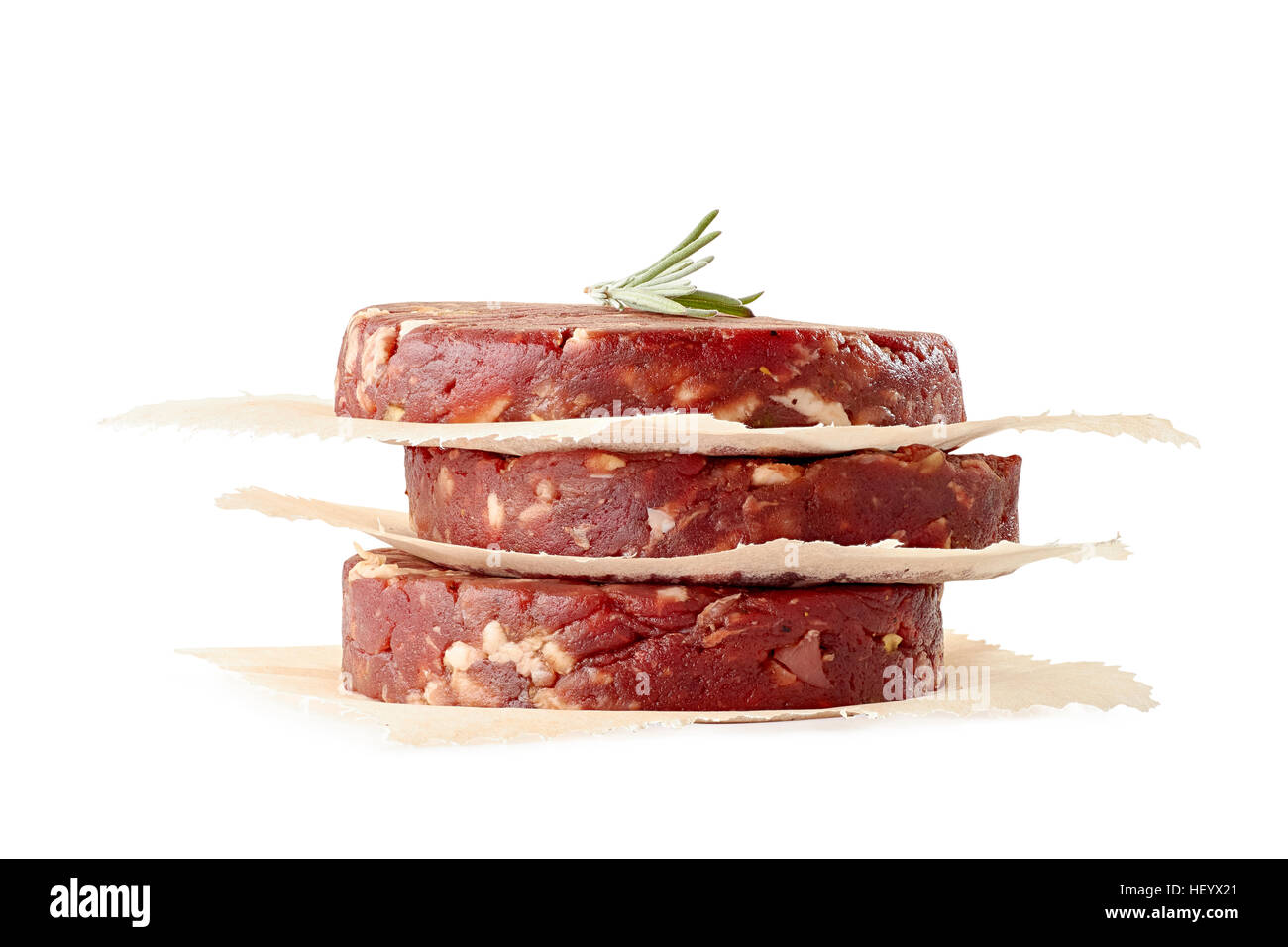 Stack of raw beef burger patties on white Stock Photo
