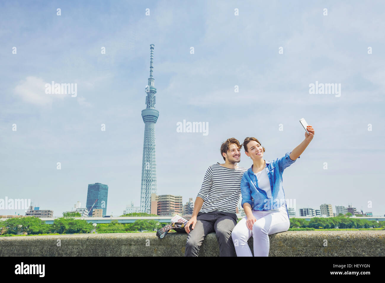 Caucasian couple enjoying sightseeing in Tokyo, Japan Stock Photo