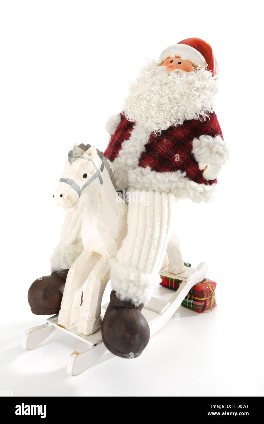 Santa on rocking horse hi-res stock photography and images - Alamy