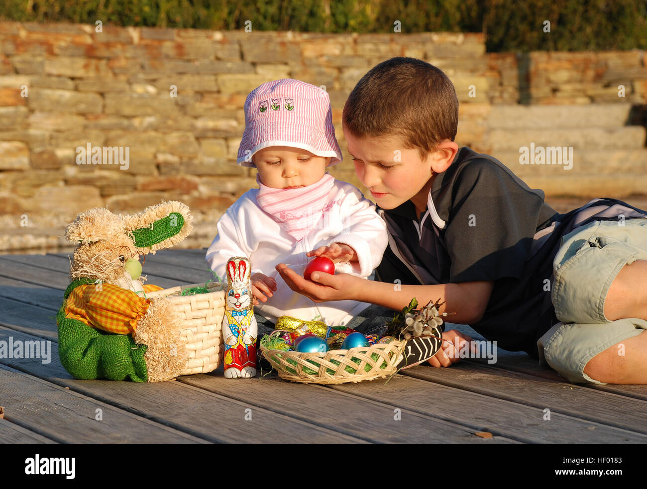 Children and an Easter nest Stock Photo