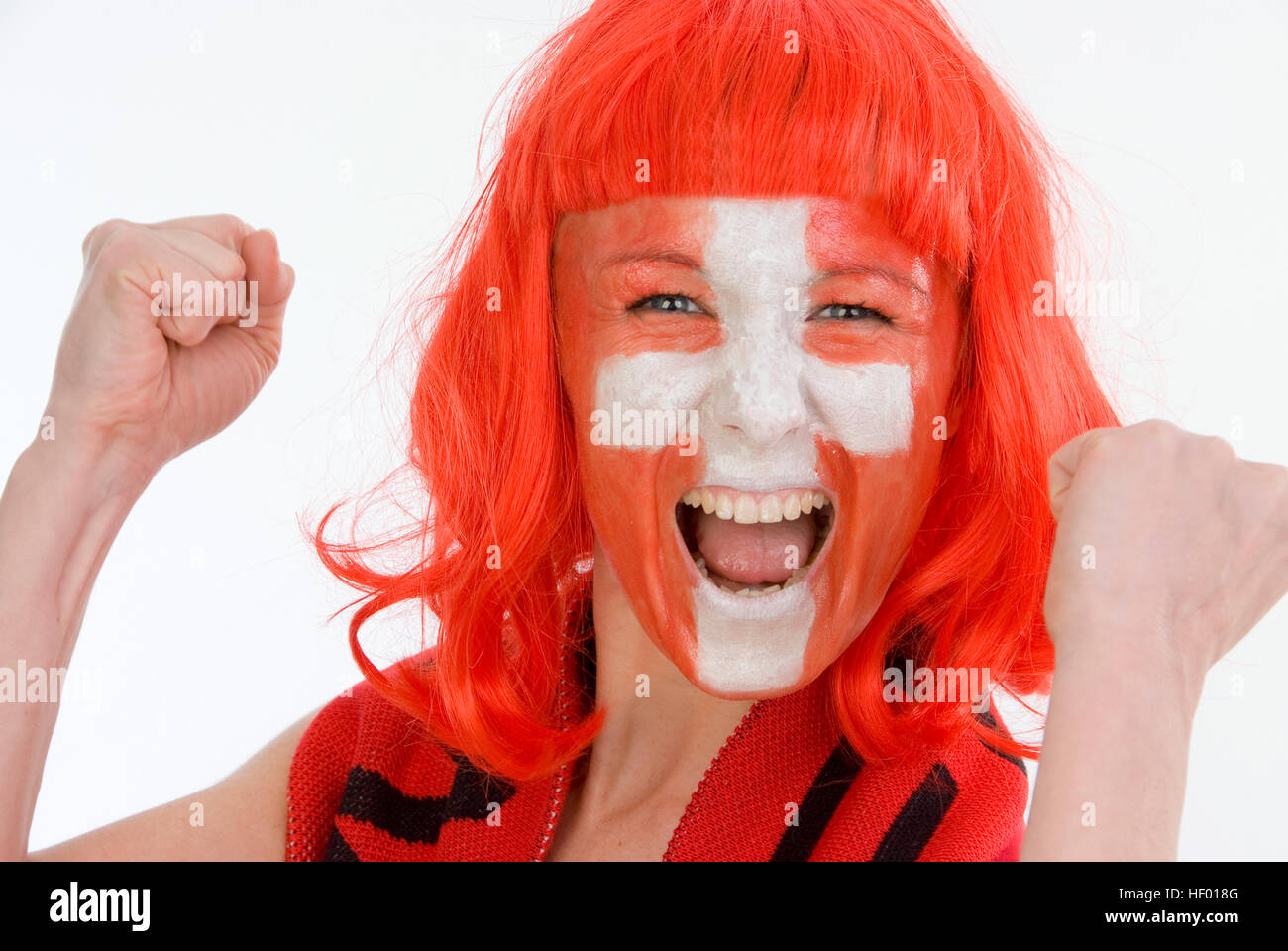 Female soccer fan with wig and football hi-res stock photography and ...