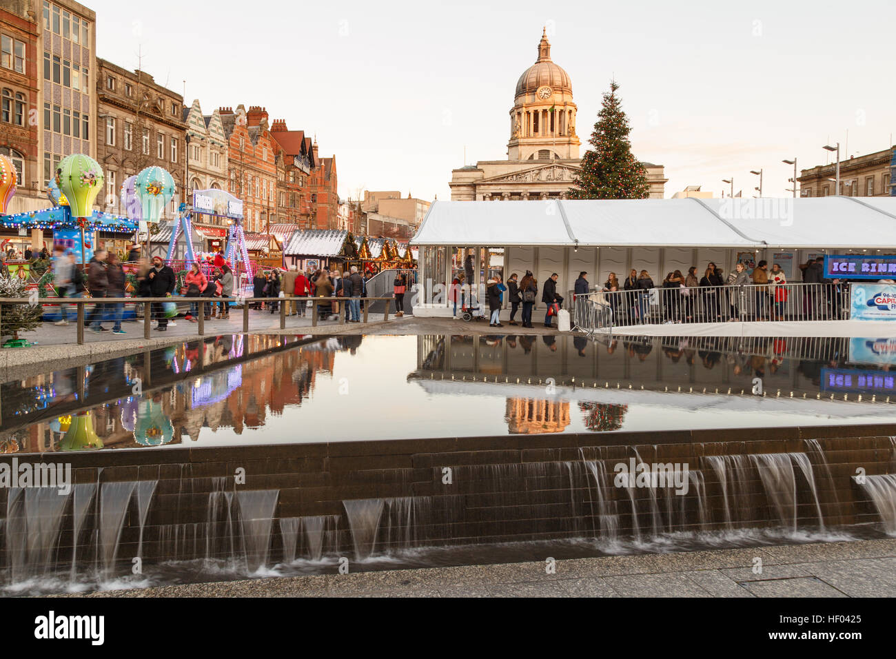 Various people at Nottingham Christmas Market and temporary ice rink