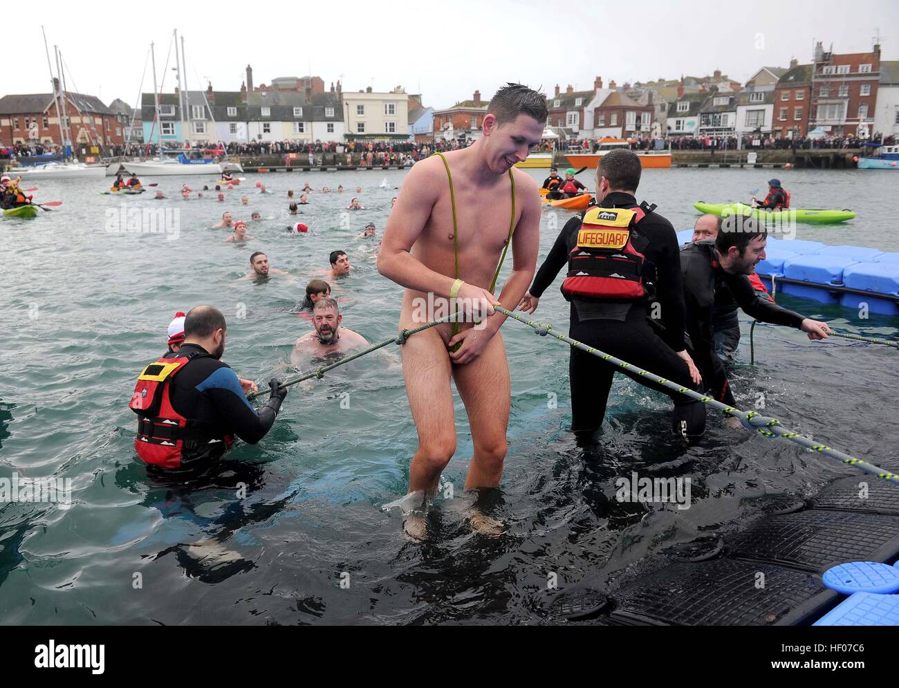 Christmas Day Swim, Weymouth Harbour, Dorset, UK Stock Photo
