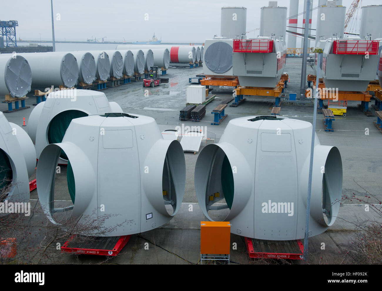 Components for the Wikinger offshore wind farm are prepared for transport at Sassnitz-Mukran port near Sassnitz, Germany, 19 December 2016. According to company Iberdrola Renovables Offshore Deutschland GmbH, the installation of the first turbines in the Baltic Sea is planned for early 2017. The wind farm's 70 wind turbines, 35 kilometres of the island of Ruegen, are to have a capacity of 350 megawatt and are to go on stream at the end of 2017. Photo: Stefan Sauer/dpa-Zentralbild/ZB Stock Photo