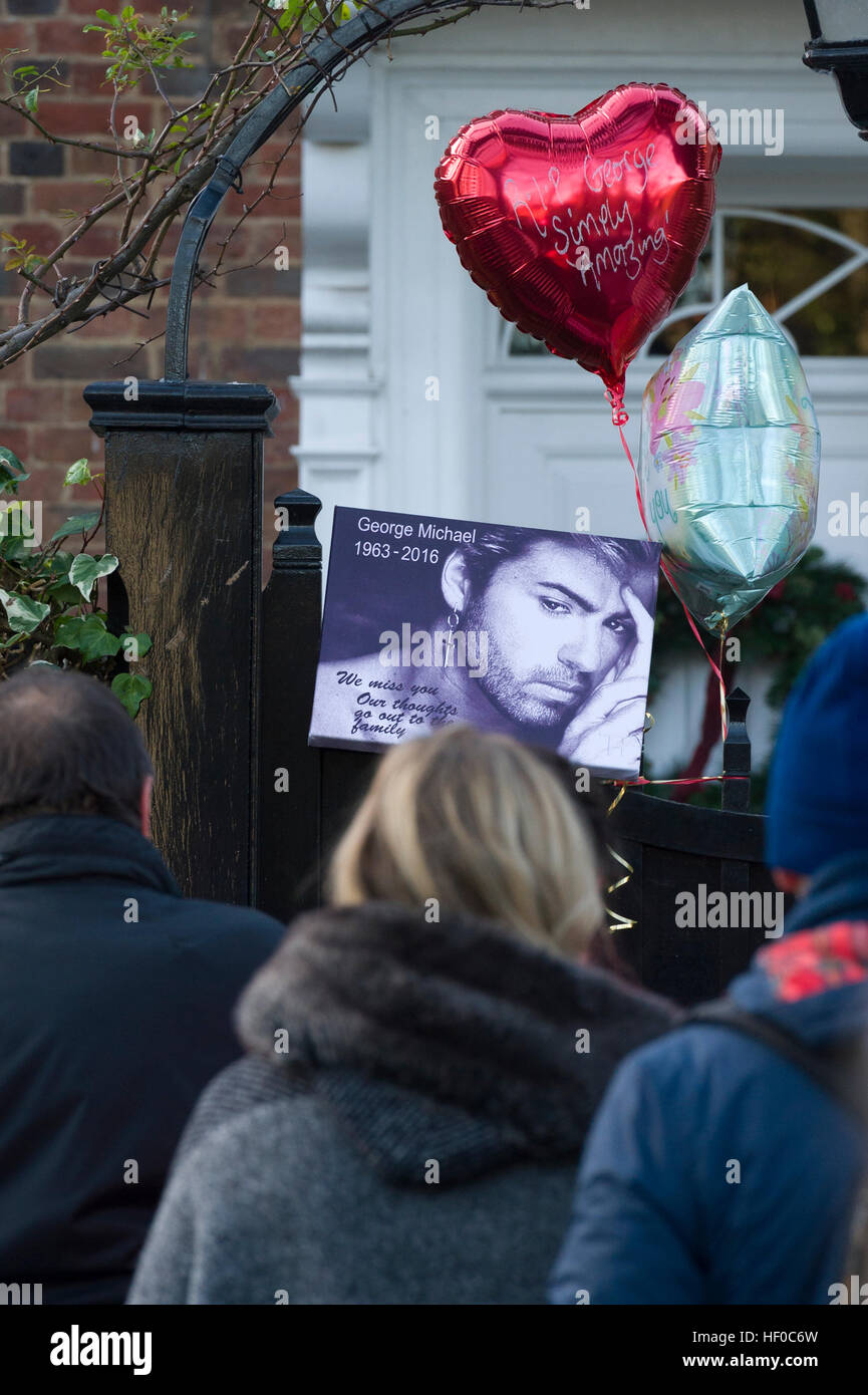 London, UK. 26th December, 2016. Fans paying respects to the memory of George Michael outside his London home, The Grove, Highgate, North London, as the pop superstar has died at the age of 53 from suspected heart failure. Credit: Alex MacNaughton/Alamy Live News Stock Photo