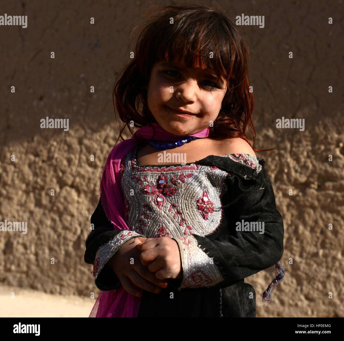 Qalat, Afghanistan's Zabul province. 26th Dec, 2016. An Afghan displaced child stands outside her tent in Qalat city, capital of southern Afghanistan's Zabul province, Dec. 26, 2016. More than one million people have to flee their home due to conflicts in the country, according to officials. © Sanaullah Seiam/Xinhua/Alamy Live News Stock Photo