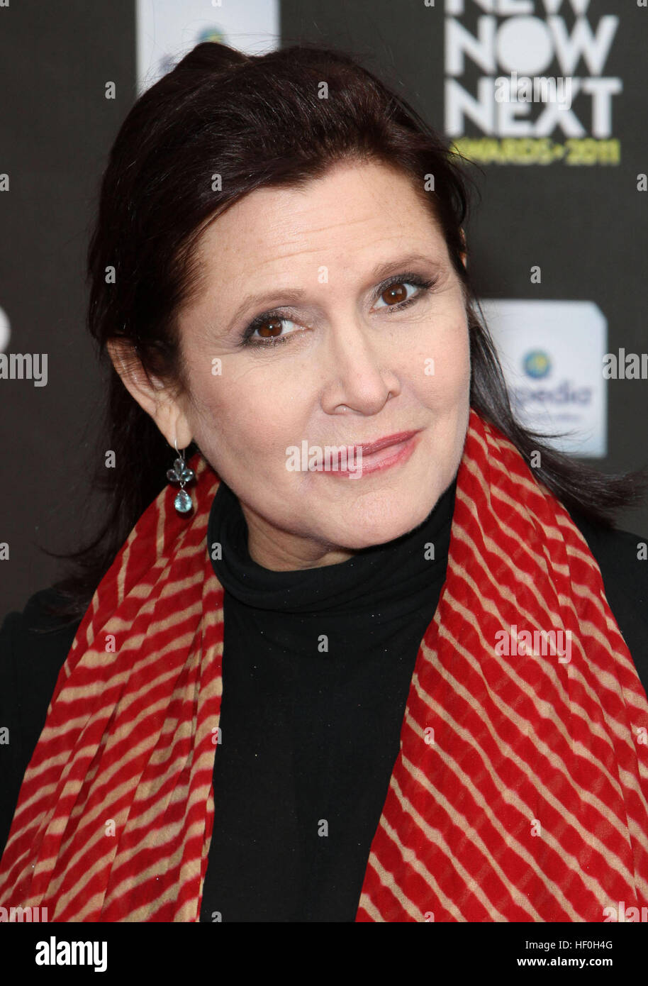 FILE PIC: Hollywood, CA, USA. 7th Apr, 2011. 27 December 2016 - Carrie Fisher, the iconic actress who portrayed Princess Leia in the Star Wars series, died Tuesday following a massive heart attack. Carrie Frances Fisher an American actress, screenwriter, author, producer, and speaker, was the daughter of singer Eddie Fisher and actress Debbie Reynolds. File Photo: 7 April 2011 - Hollywood, California - Carrie Fisher. Logo's ''NewNowNext Awards'' 2011 Held At Avalon. Credit: ZUMA Press, Inc./Alamy Live News Stock Photo