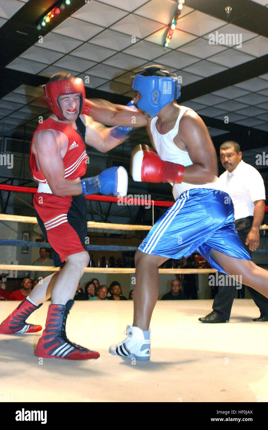 A Marine practices boxing footwork techniques during physical fitness ...