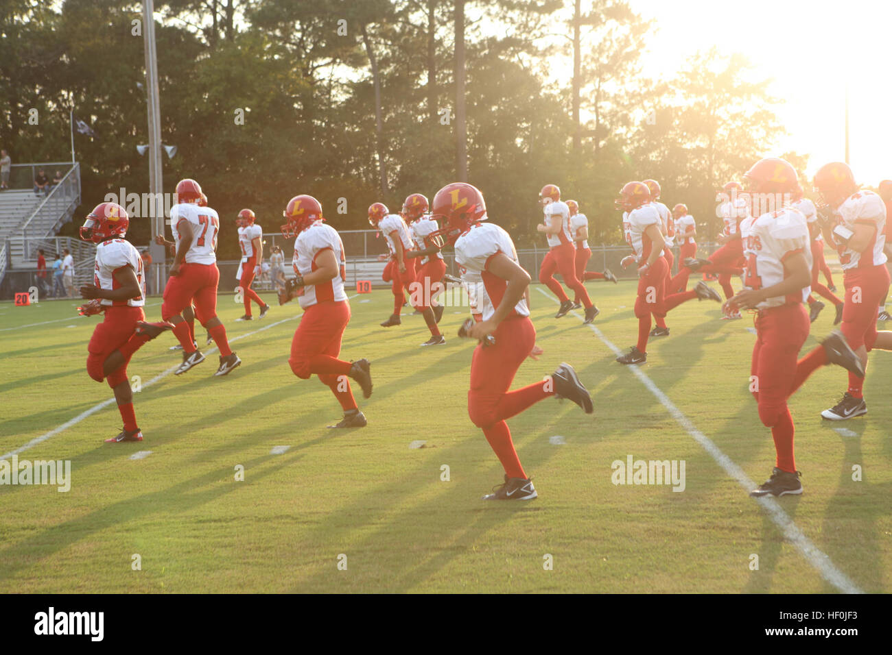 Lejeune High School assistant football coach Mike Gardner practices Big